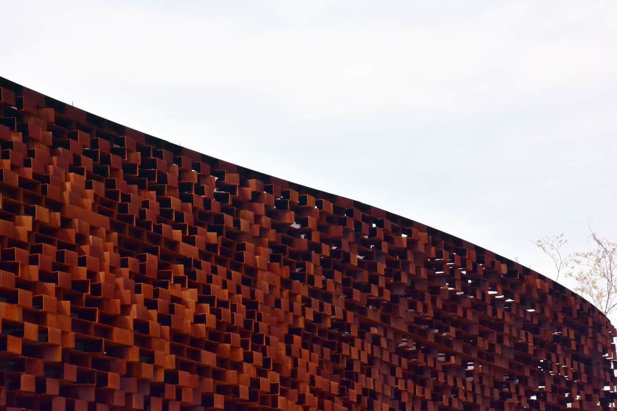 Weathered corten steel with an orange oxide surface