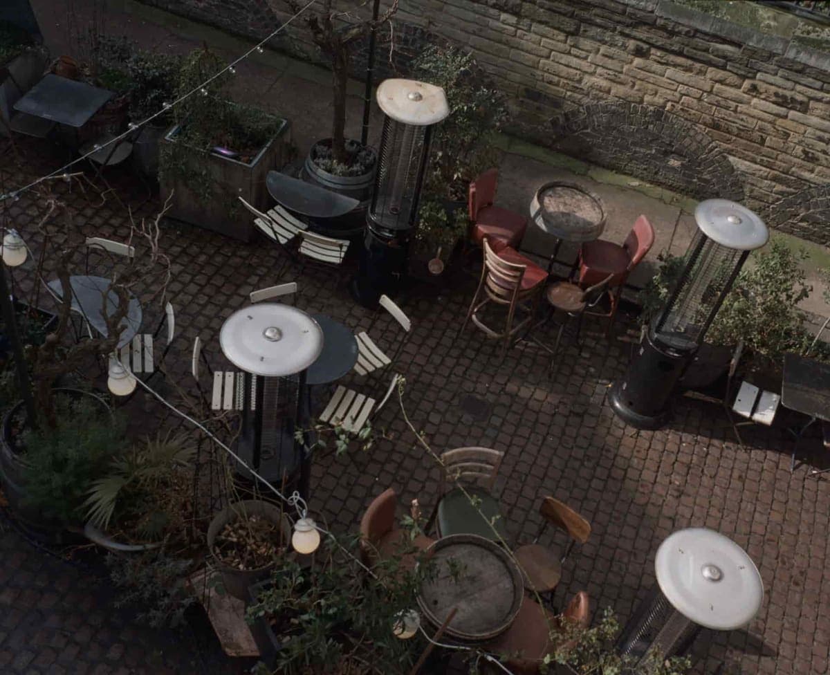 Tables and chairs on an outdoor terrace