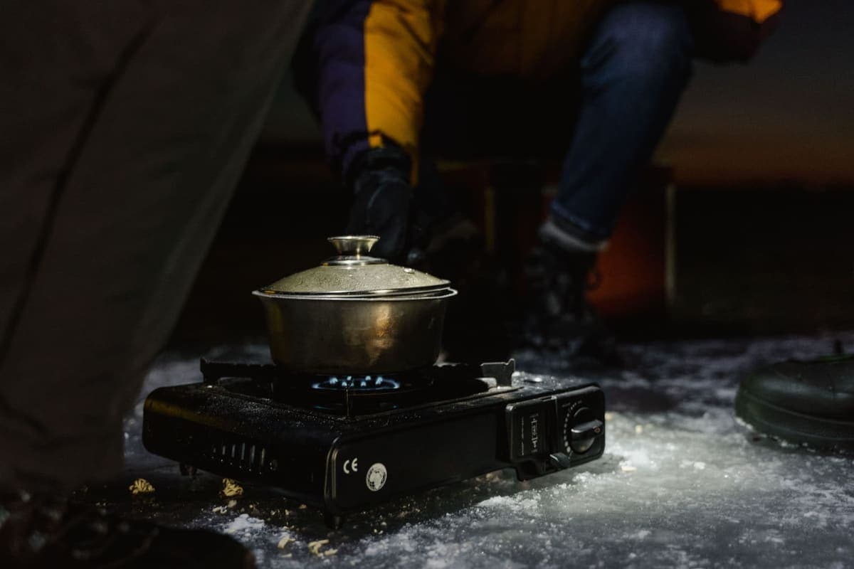 A small portable gas stove set up outdoors