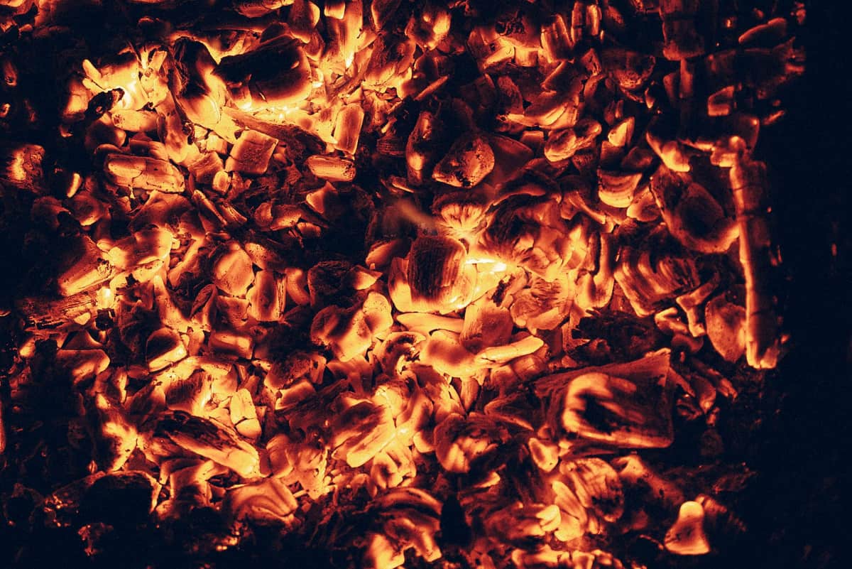 Burning charcoals glowing in close-up