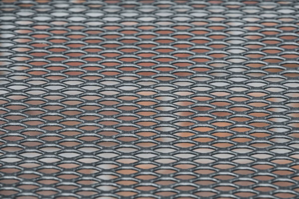 Close-up of a perforated metal grid pattern