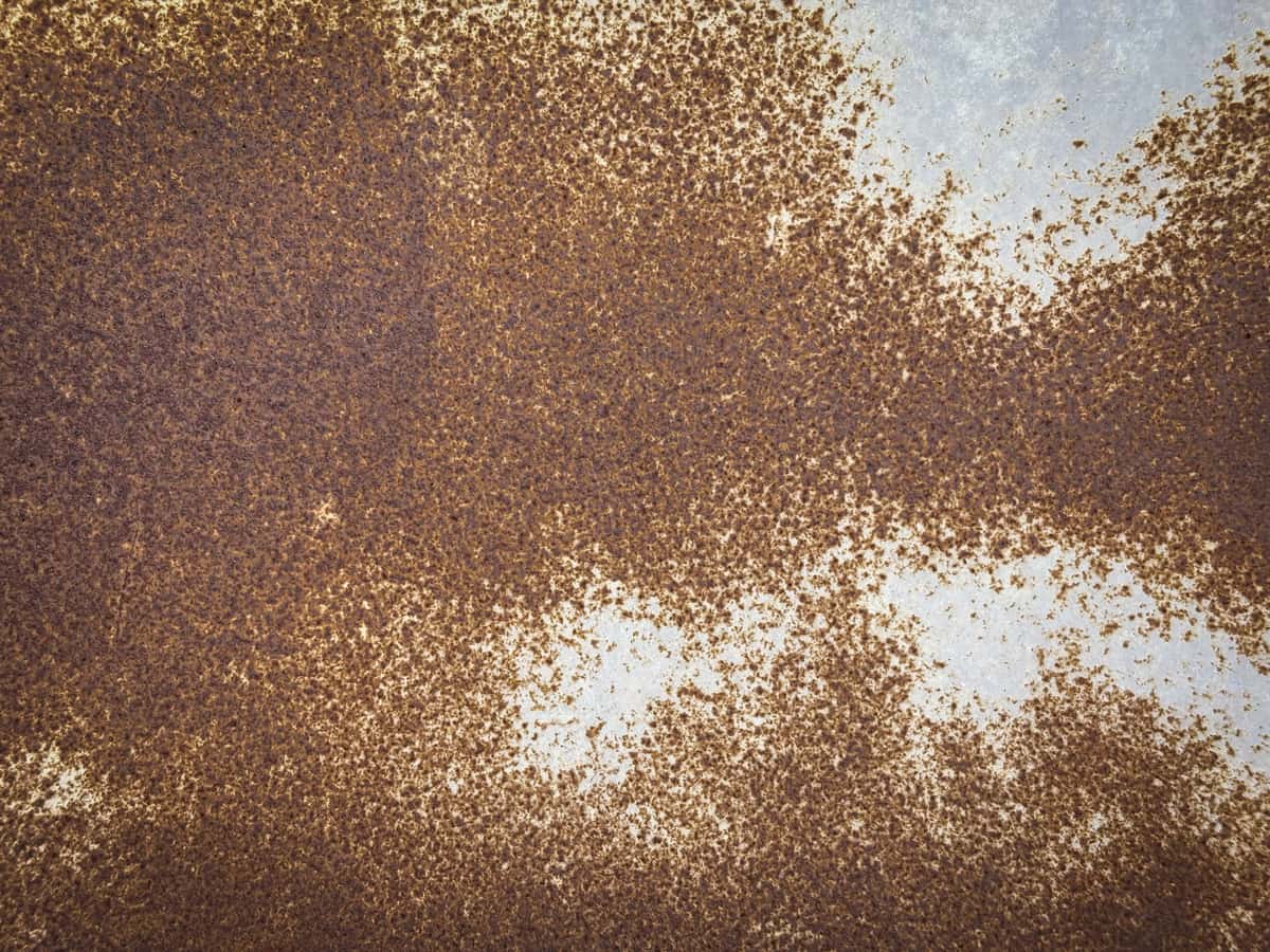 A sheet of steel covered in spreading orange surface rust